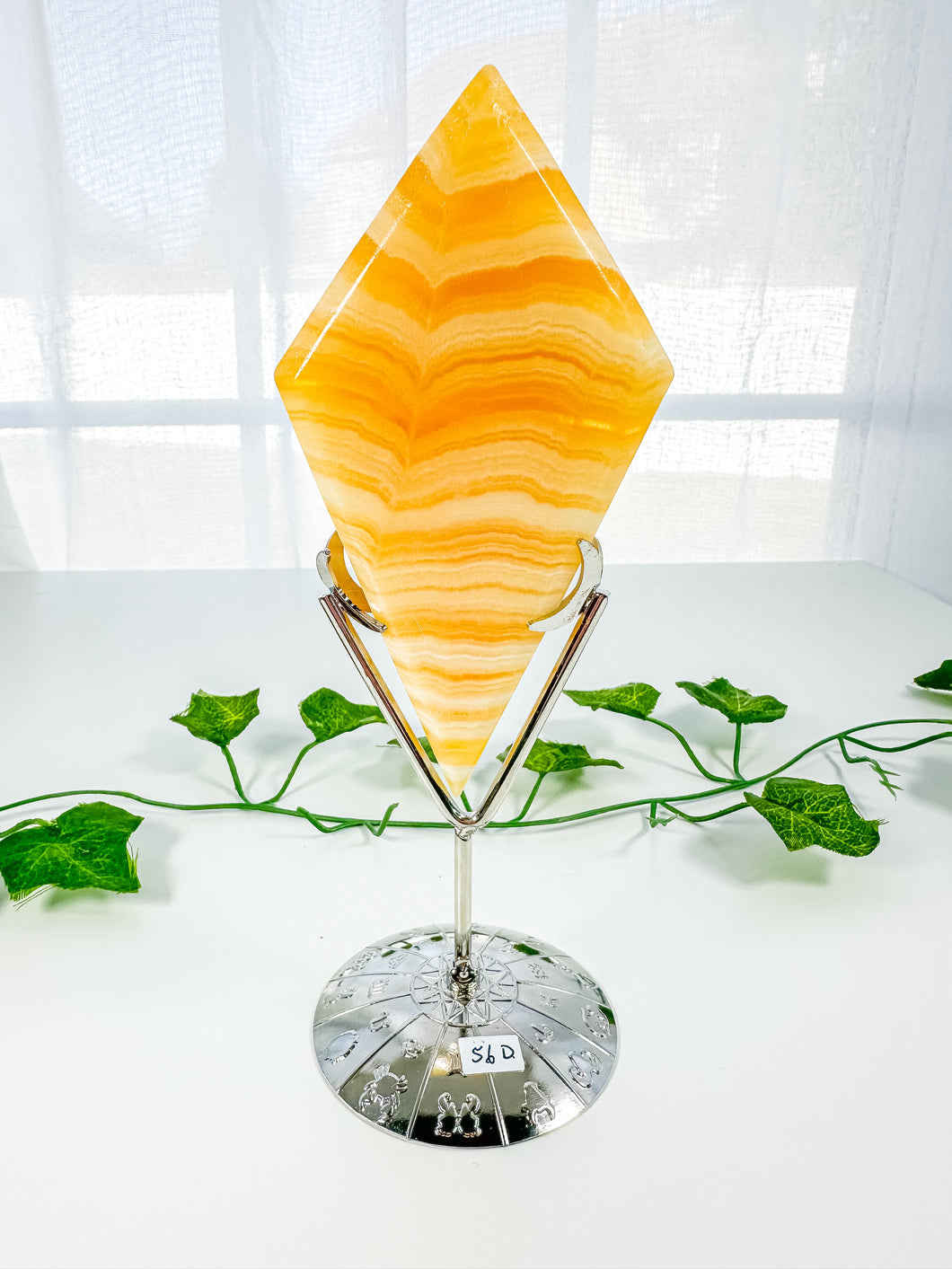 Orange Calcite Diamond on Stand (56D)