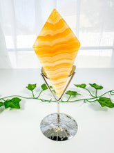 Load image into Gallery viewer, Orange Calcite Diamond on Stand (56D)
